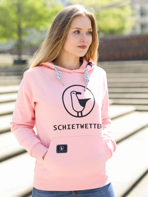 Frau mit rosa Schietwetter-Pulli